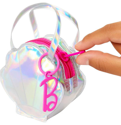 Barbie Clothes Set, Beach-Themed with Swimsuit, 5 Acessories & Zippered Doll-Sized Shell-Shaped Bag with Clip-On Ring, Iridescent